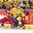 BUFFALO, NEW YORK - DECEMBER 31: Sweden's Axel Fjallby Jonsson #22 takes out Russia's Artyom Manukyan #10 along the boards during preliminary round action at the 2018 IIHF World Junior Championship. (Photo by Matt Zambonin/HHOF-IIHF Images)

